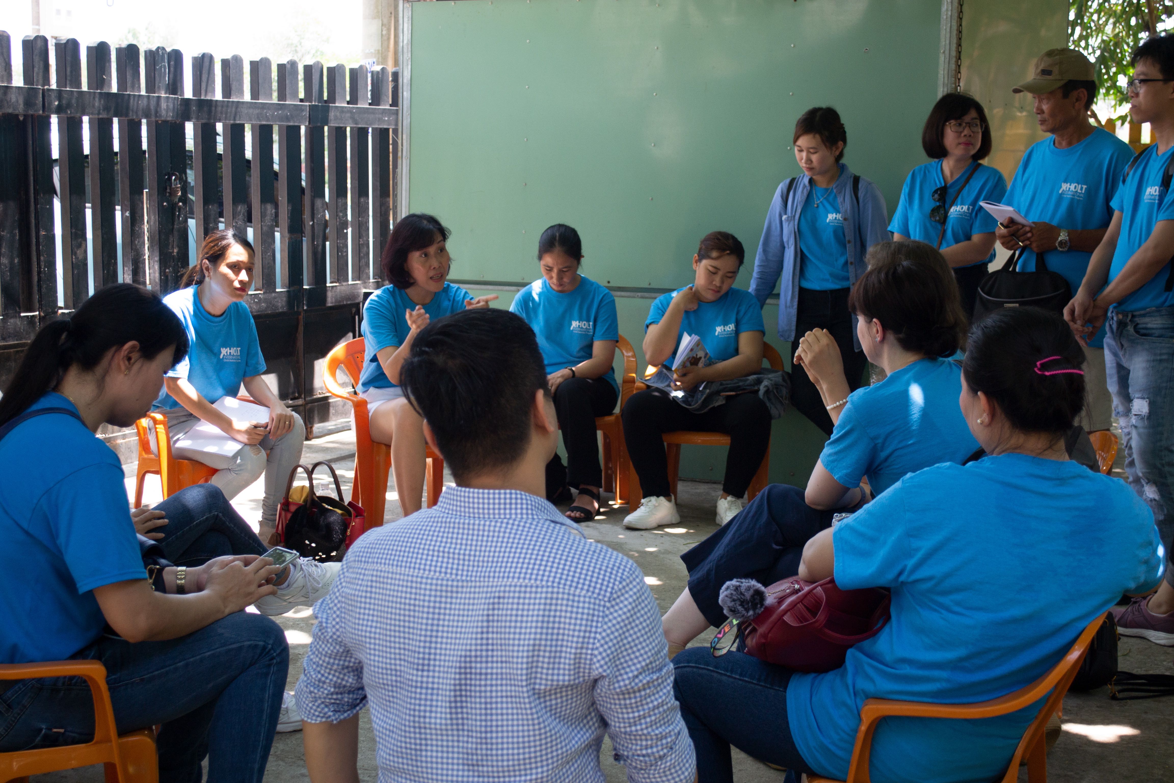 Holt staff and caregivers in Vietnam are learning from the new feeding and positioning manual.
