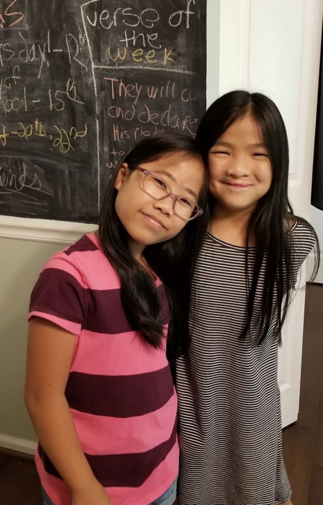 Thirteen-year-old Mia, pictured with her family and with her sister Nicole, also adopted from China. While giving her the support she needs to adjust to her new life in the U.S., Mia’s parents have also helped her maintain her relationships with her friends and foster mom back in China. 