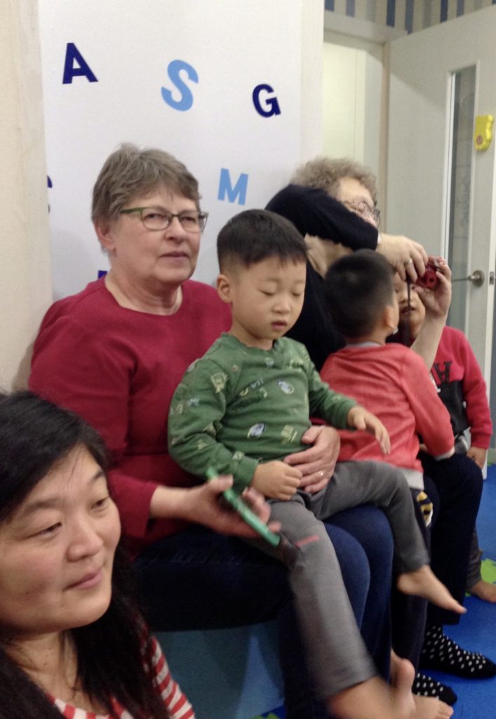 Mary at an orphanage on the 2016 Holt gift team trip, when a team of Holt supporters travels to Korea to deliver gifts to children and residents at Ilsan, Jeonju Babies' Home and other Holt programs.