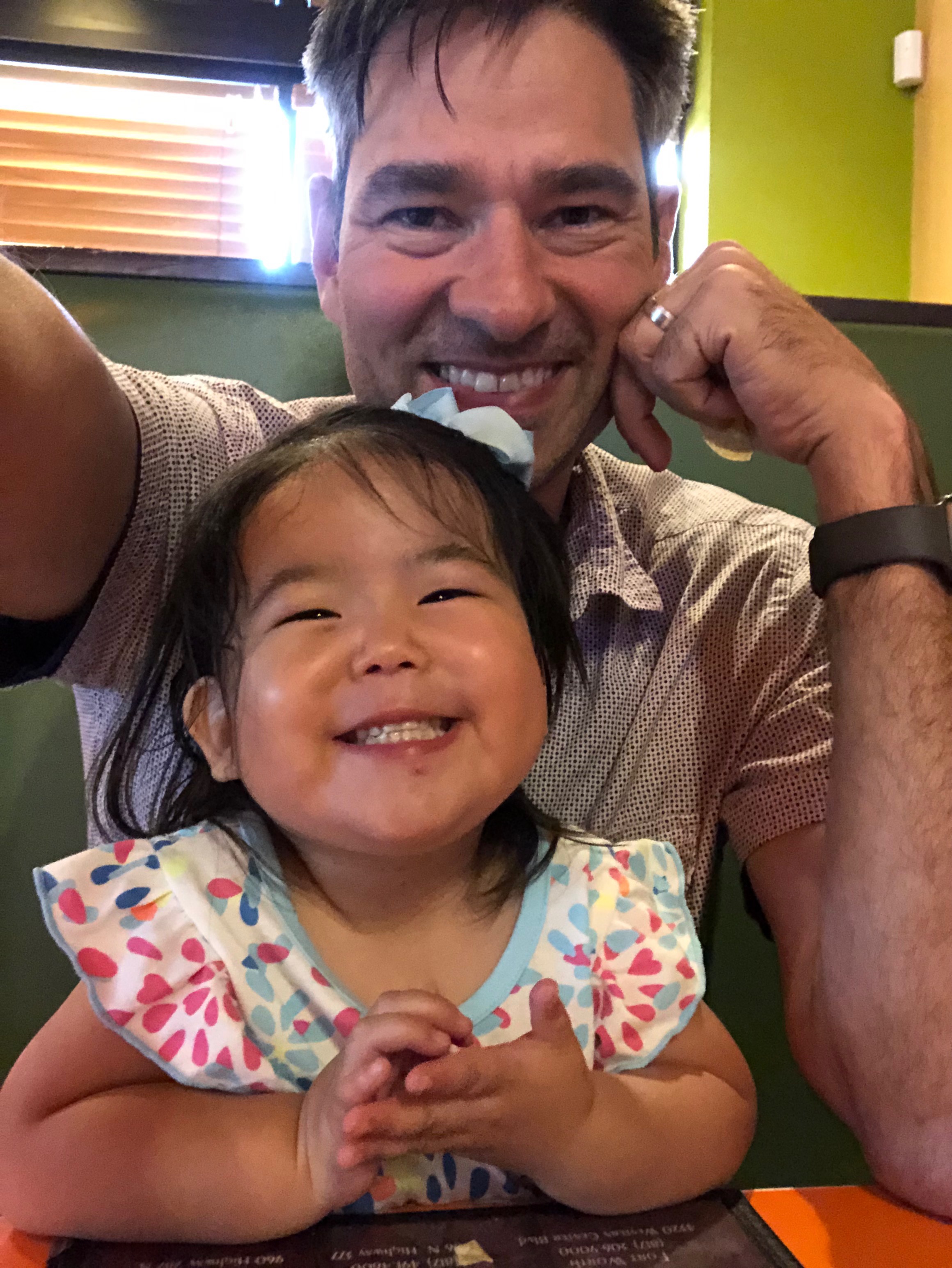 adoptive dad and child