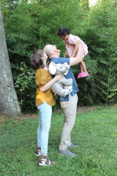 Two-year-old Nam Fon with her parents. 