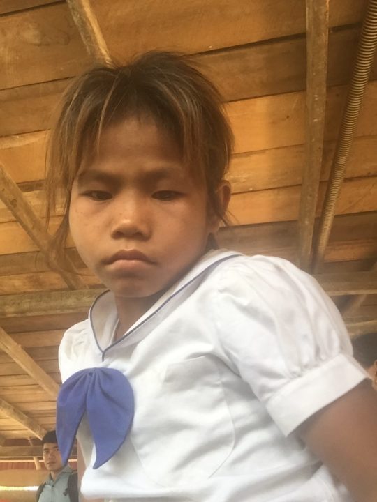 "Tiny, impossibly thin with straggly hair turning yellow from lack of nutrition, and a broad face with deep, serious eyes, 10-year-old Phal captured my entire heart the moment I saw her."