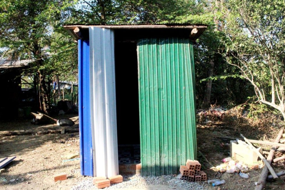 This new outhouse replaced the very dangerous and unsanitary one that they used before. 