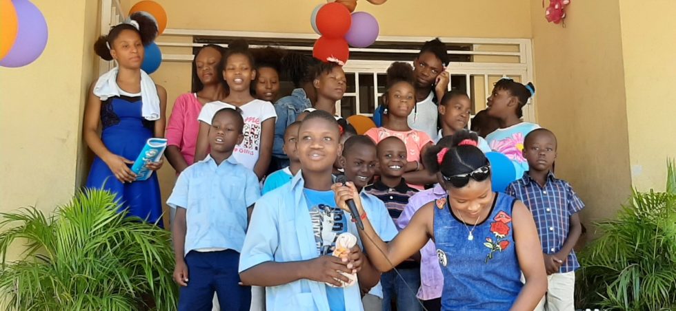 The kids gathered for a celebration at the end of the life skills training at the transit center in Haiti. 
