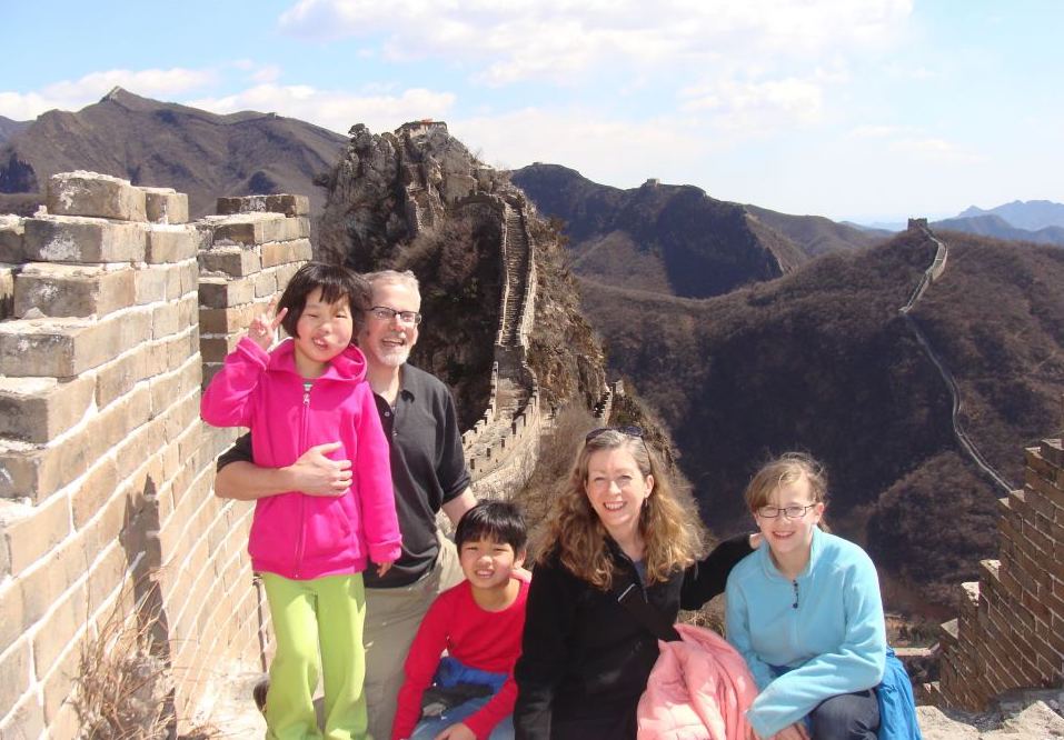 The Currys, who appear in the new adoption documentary "Hayden and Her Family," on their first family hike with Hayden, a trek across part of the Great Wall of China.