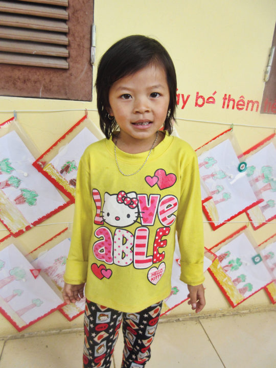 Adoptee and Holt sponsor Clare Larson’s sponsored child, Tuyen, at about the same age that she was when she came into orphanage care as a child growing up in Vietnam.
