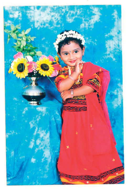 Growing up, Kiran loved to dance and sing — shining in every class performance.