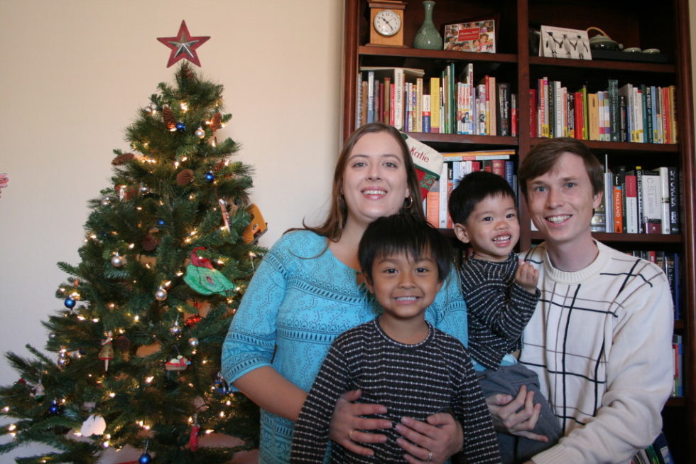 Chattrapat (center), now Robert, with his parents and brother in a photo sent to the sponsors who supported him before he joined his family. 