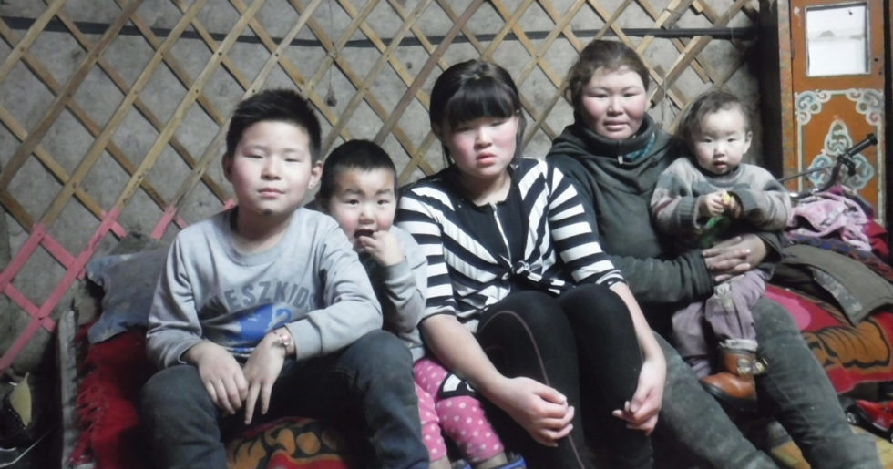 Munkhbold (far right) with his mom and three siblings.