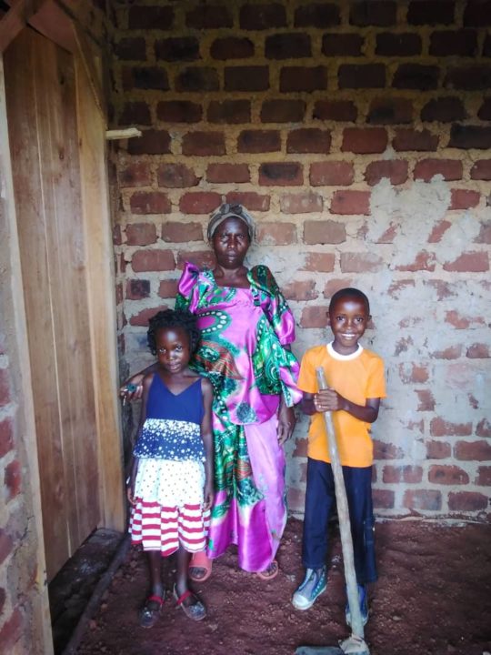 Yasin and his family inside their new home. 