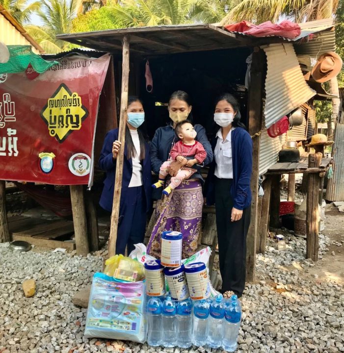 A family receives an emergency supply of food and clean water.