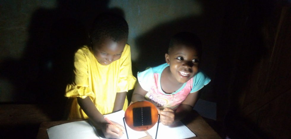 In Uganda, our staff provided solar lamps to help children without electricity study from home — a key part of Holt's pandemic response.