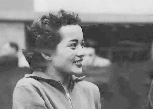 black and white historical photo woman smiling