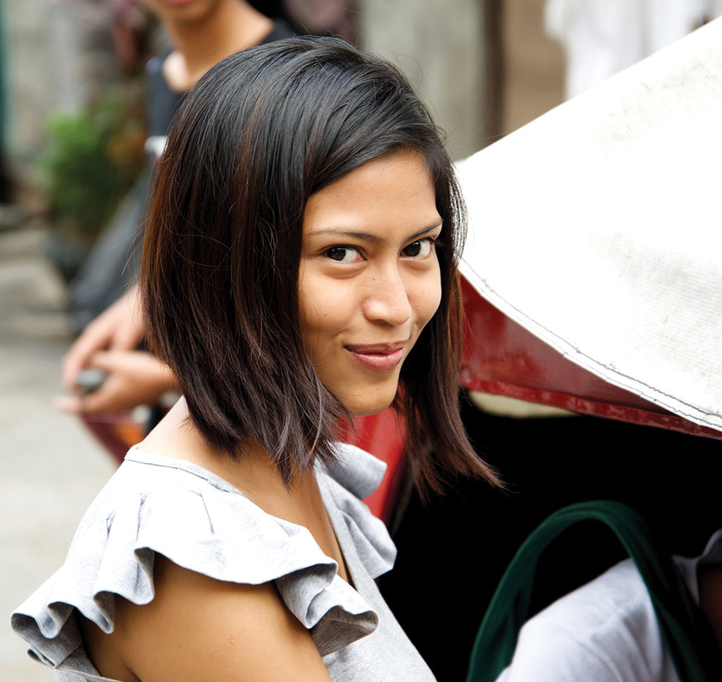 woman smiling looking into the camera