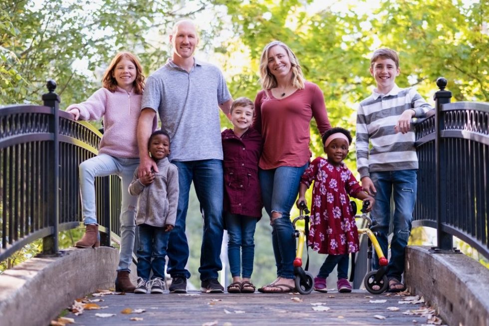 The Turner family, including their three biological children and two children they adopted transracially from South Africa.