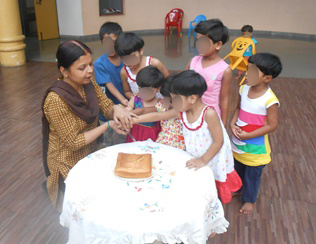 Children having birthday party in India