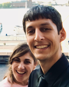 selfie of smiling man and woman