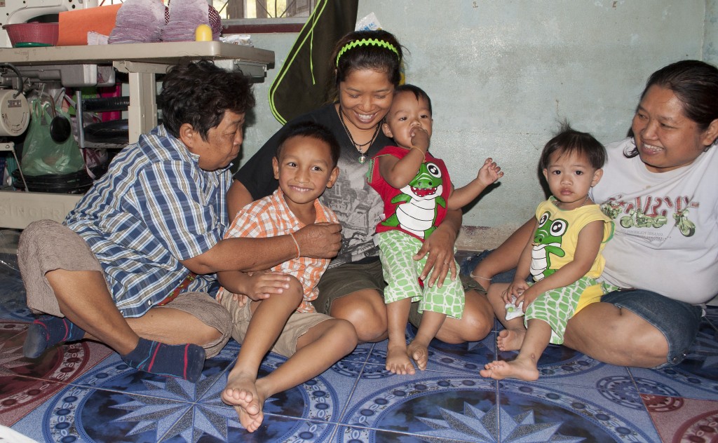 Foster family and children playing together