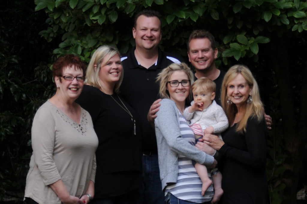 family portrait of seven people