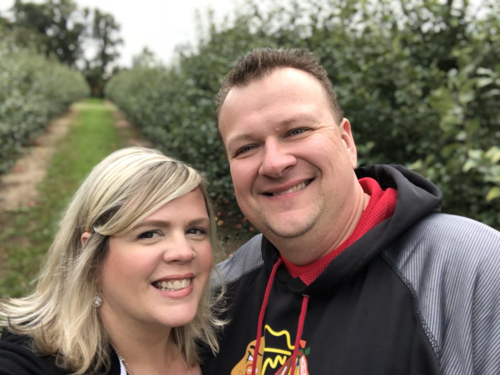 woman and man smiling at camera