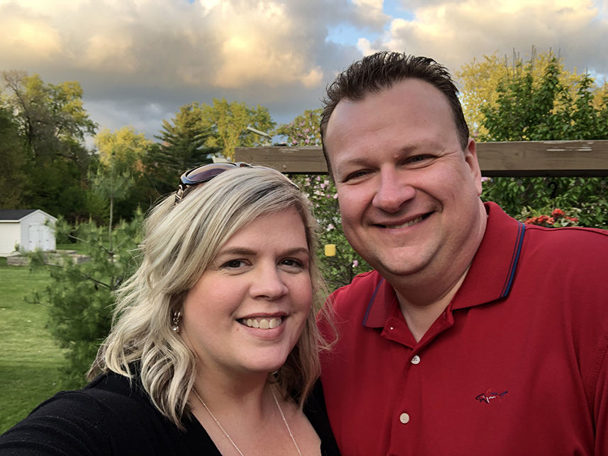woman and man smiling at camera