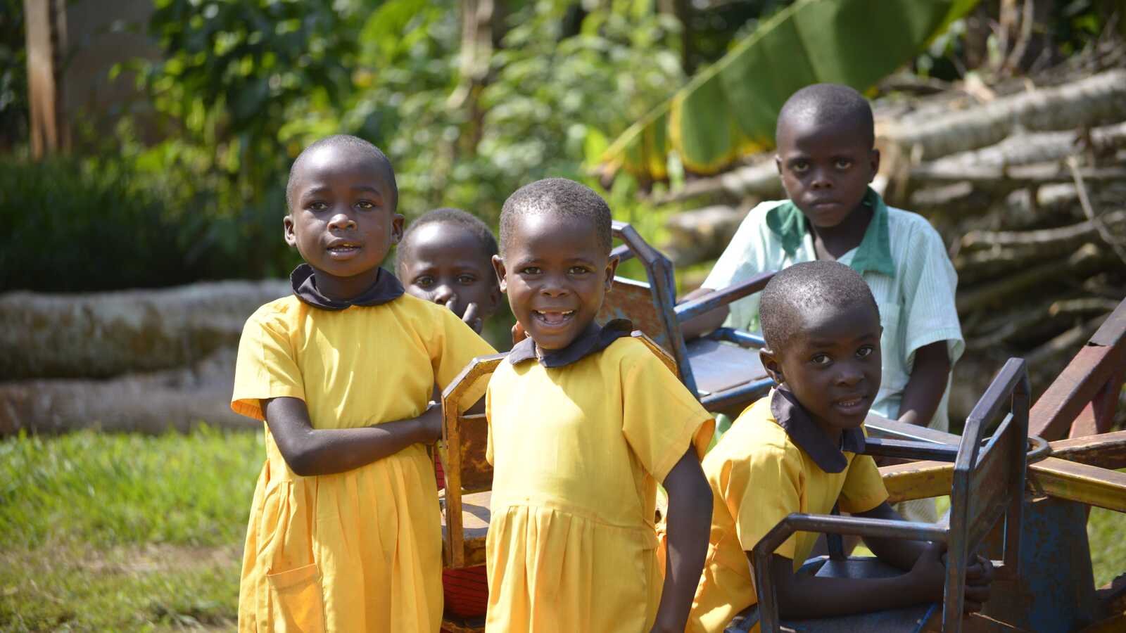 girls in yellow dresses in Uganda