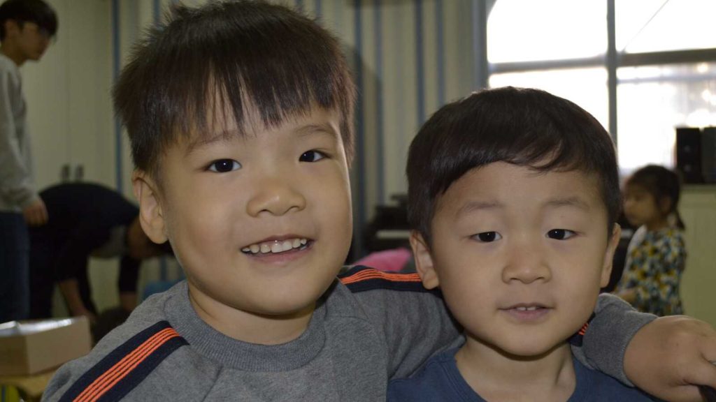 Korean boys smiling in school