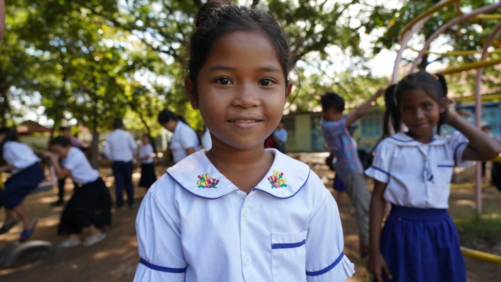 school girl smiles for camera