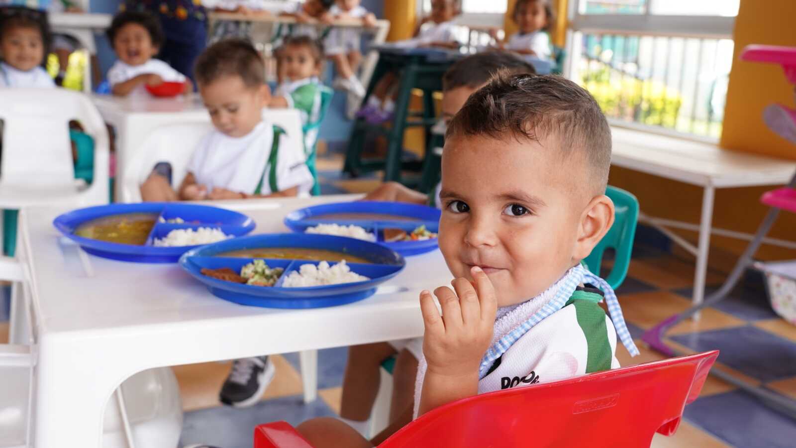 children eating in classroom