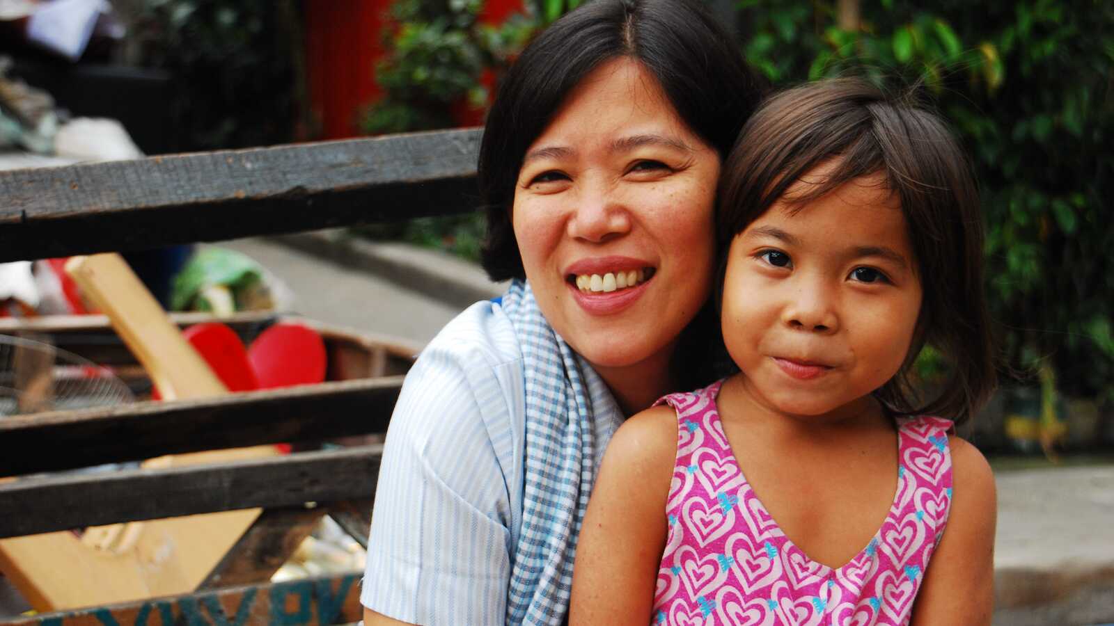 Woman smiling with child