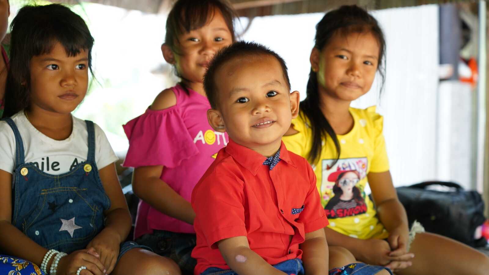 four children posing for photo in Cambodia