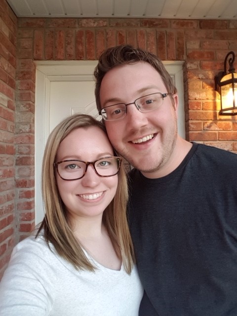 selfie of man and woman in glasses