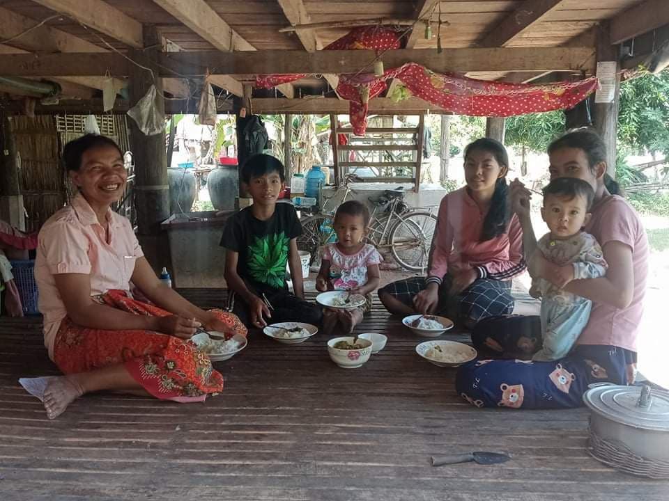Family eating in Cambodia