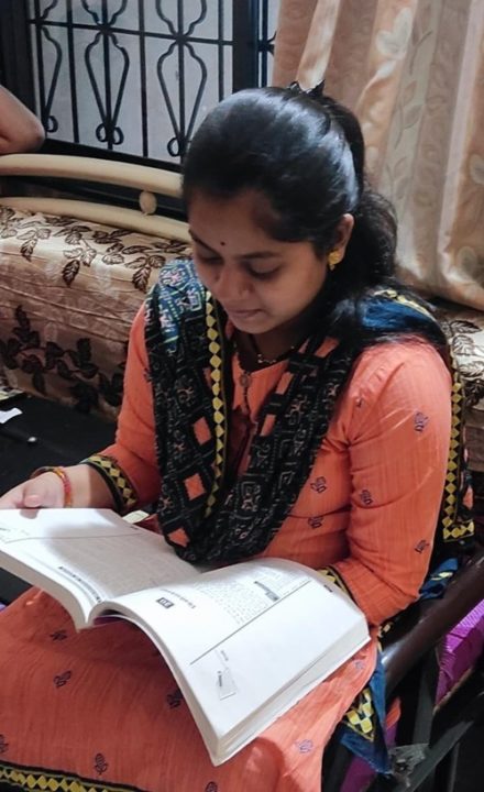 Daksha reading a book