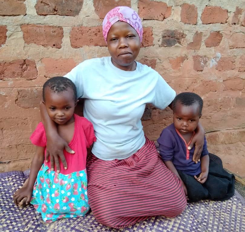 Mother with two children in Uganda