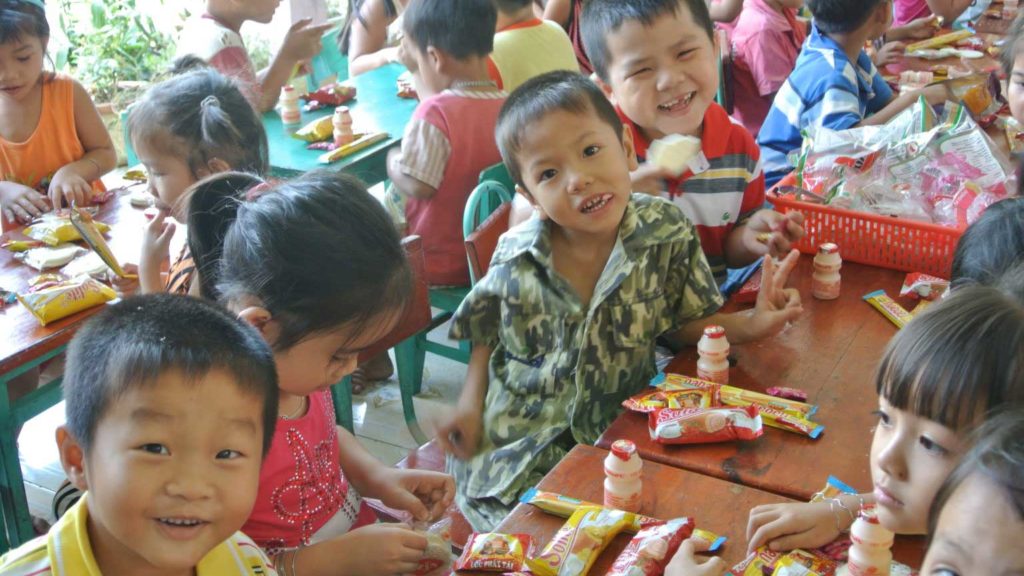 Children eating at Vietnam Daycare