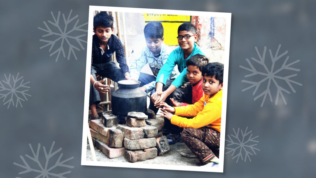 Boys in India who are cold and need help