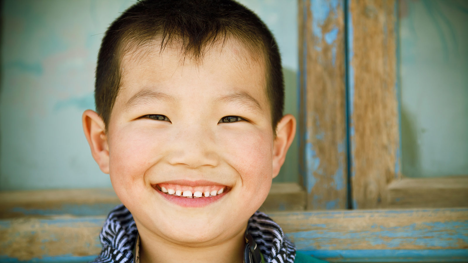 smiling boy from Mongolia