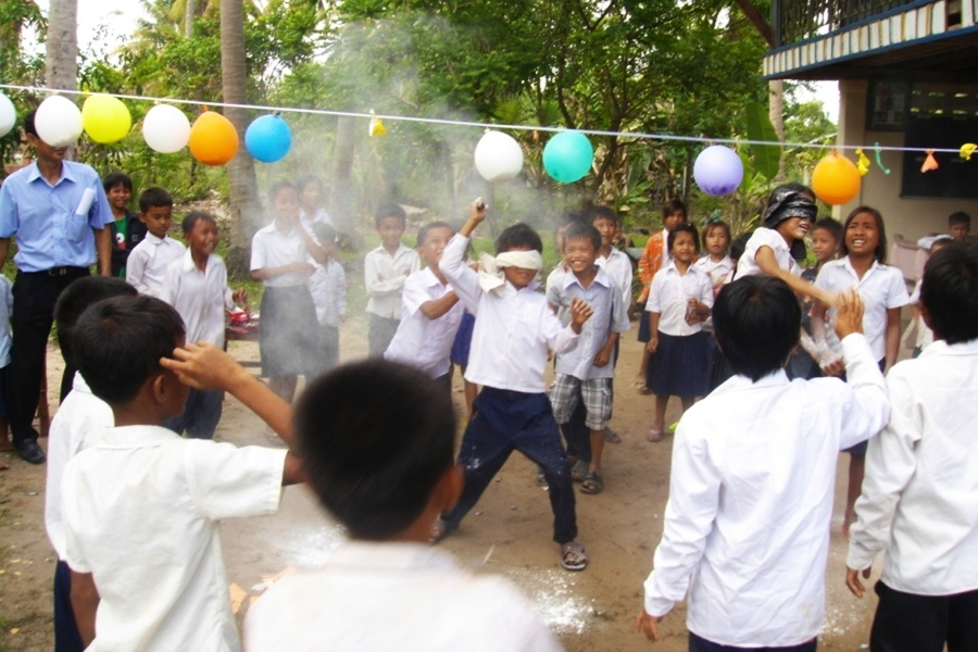 Child with Birthday gift in Cambodia