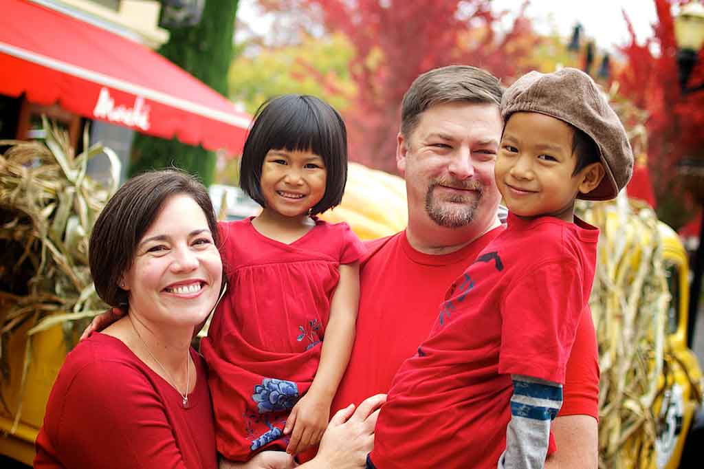 The Doig family. Susie and her husband adopted two children from Thailand.