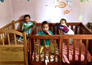 Babies in crib at orphanage