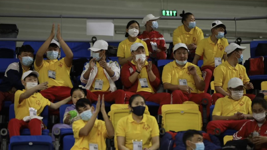 Children cheer in the stands