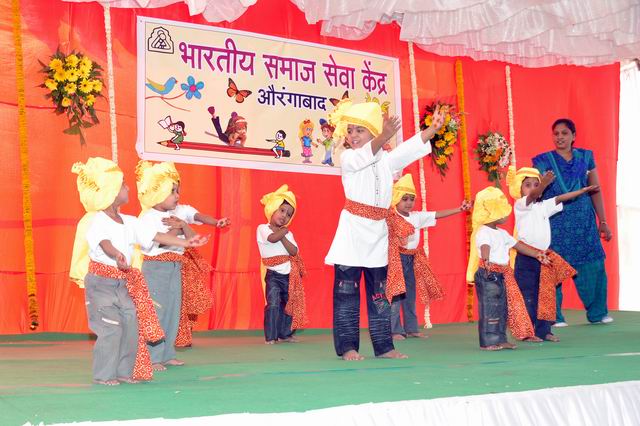 Children in care at BSSK perform a dance during the inauguration ceremony.