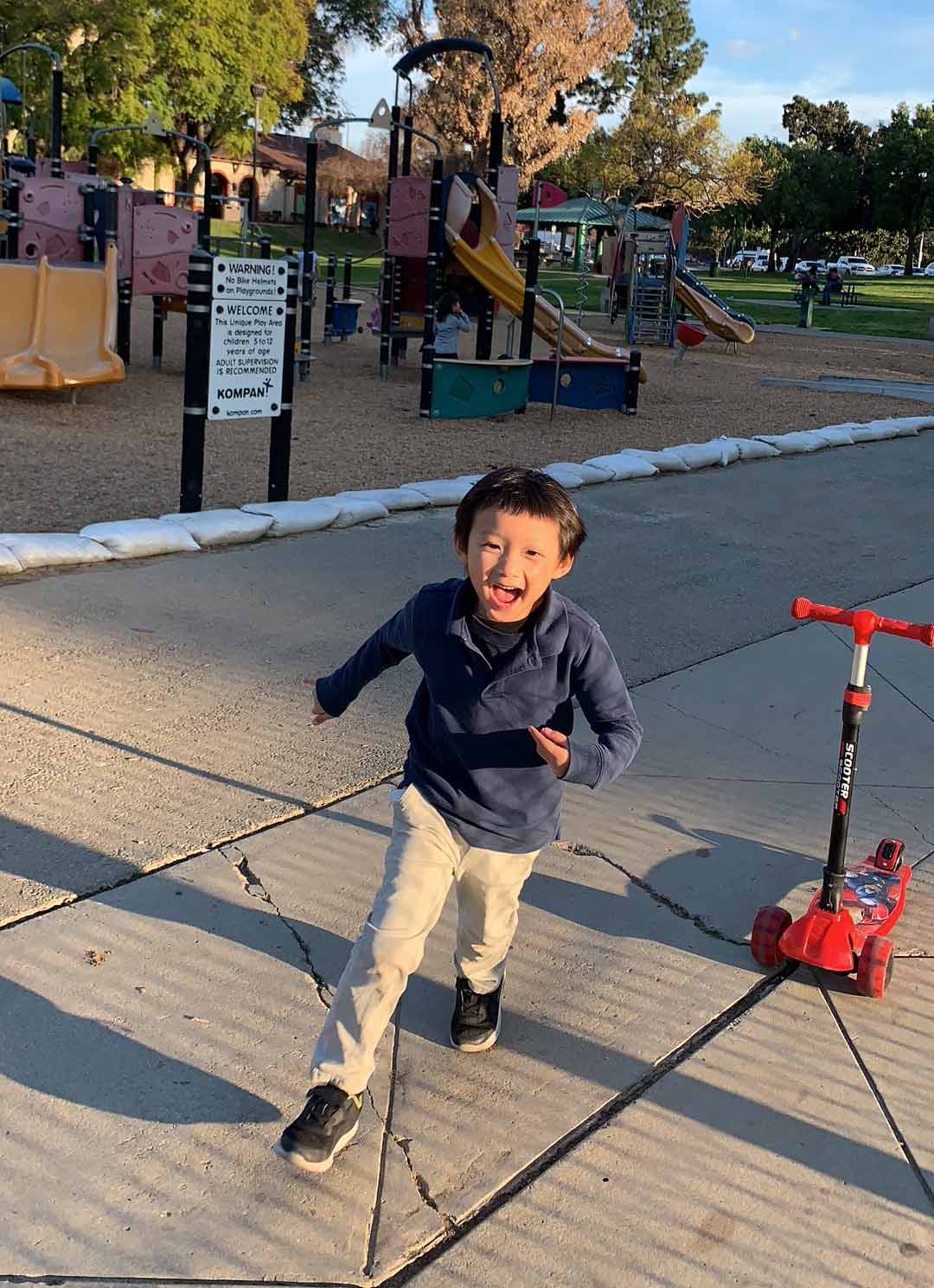Boy playing on playground in Los Angeles