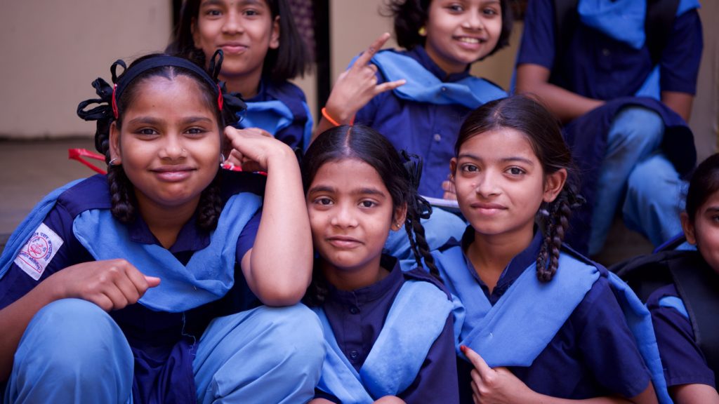 Girls in blue uniforms in India