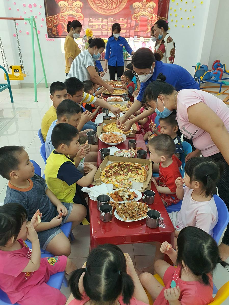 children in Vietnam eating food celebrating set