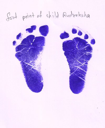india child sponsorship photo of baby footprints