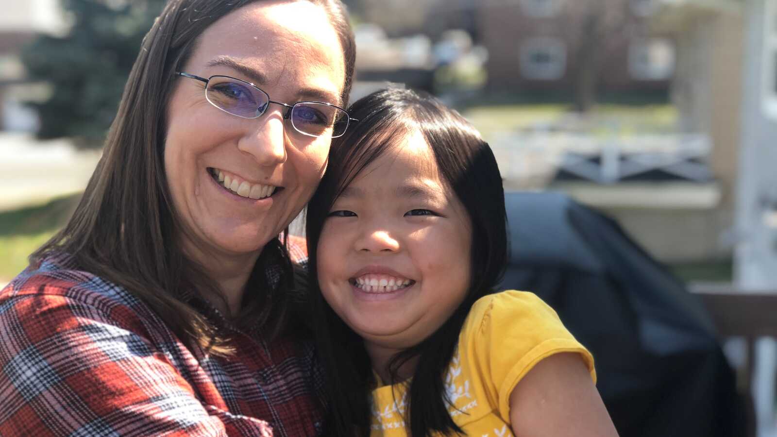 adoptive mother with daughter adopted from china