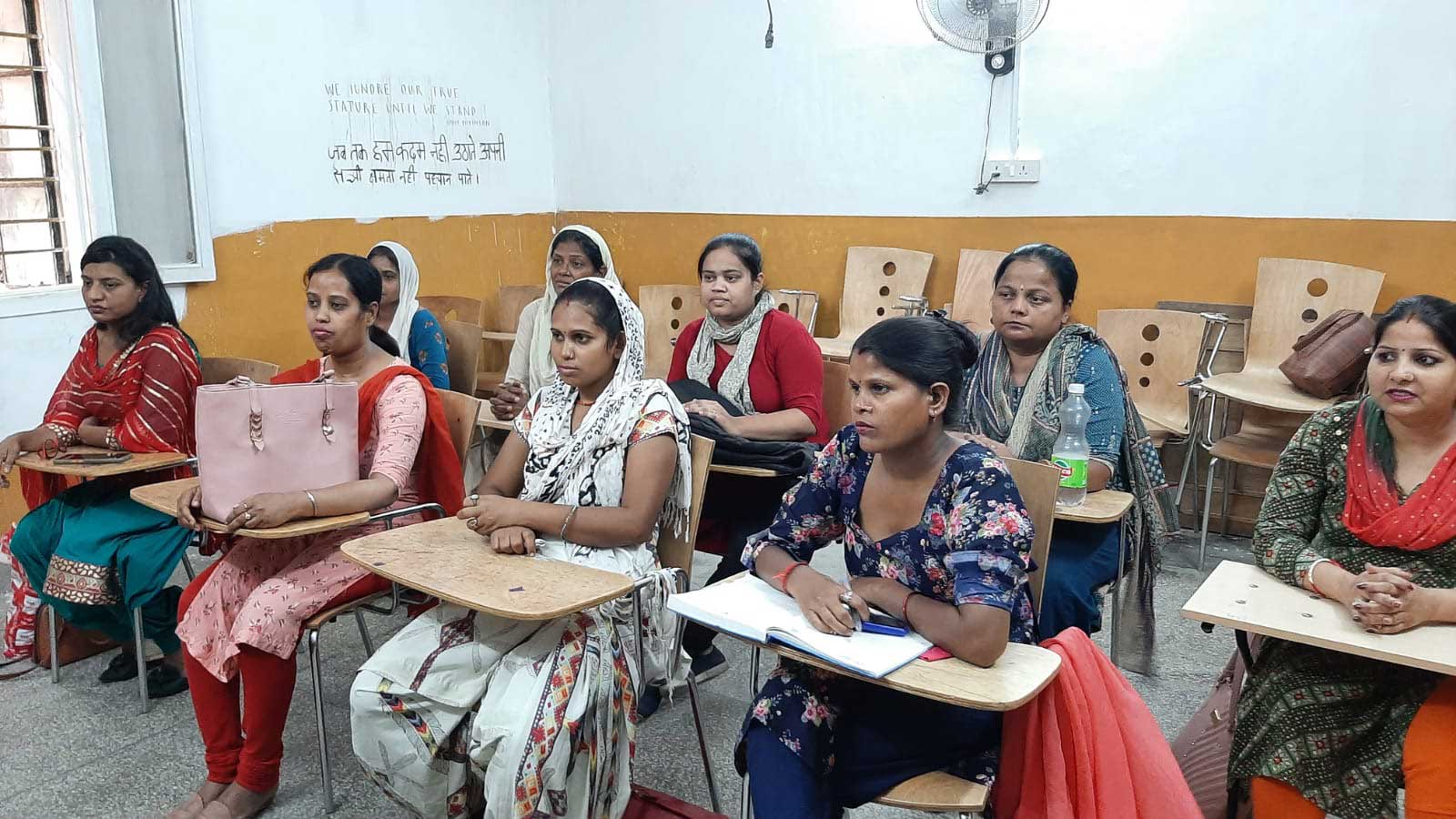 Mothers attending a job skills training program in Delhi, India