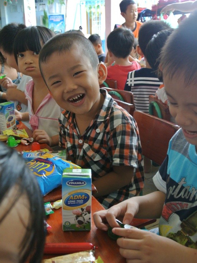 Child with Birthday gift in Vietnam
